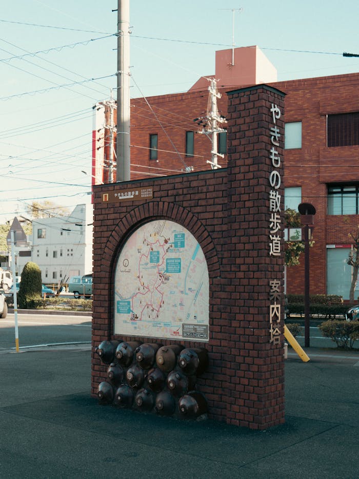 Discover Tokoname through this brick landmark featuring a local map, ideal for urban exploration.
